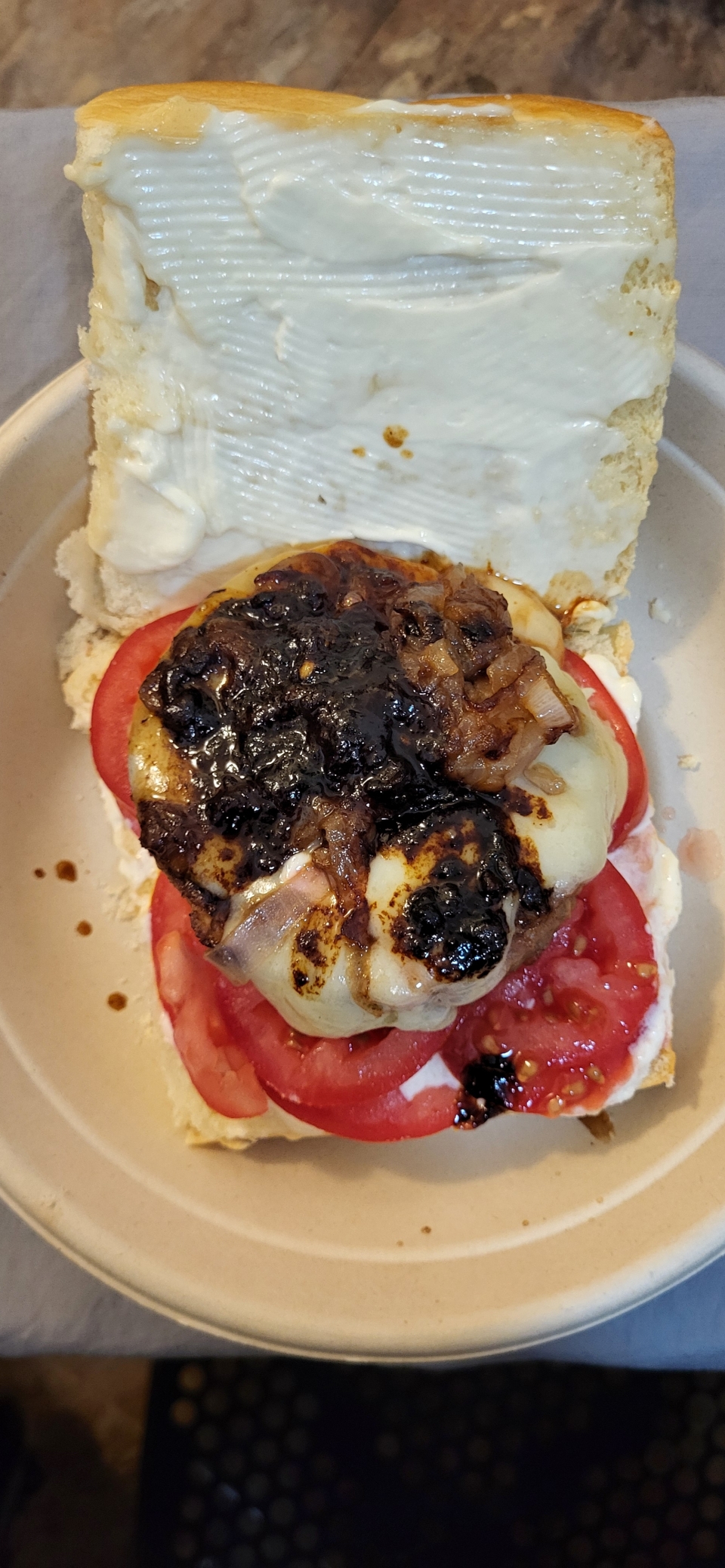 Hawaiian roll, mayo, horseradish, tomato slices, impossible burger , NY extra sharp cheddar cheese, fried onions and pan drippings.