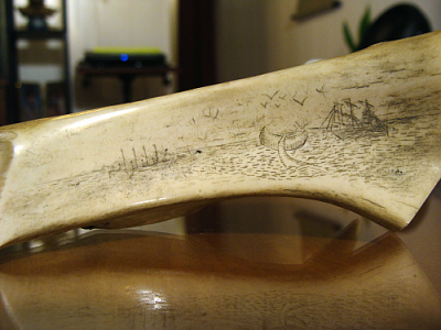 DECADES ago I met a Scrimshaw artist, Norwood Marlow. I got him to teach me how to scrimshaw. He gave me a couple of pieces of staghorn to work on. Proper scrimshaw is on whale or elephant ivory - both of which are illegal - rightfully so.So I had to learn how to polish the surface, and etch an image, and then ink it. This is one of the few pieces I did at that time (around 1975 or so).